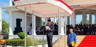 Bupati Rohil Pimpin Upacara Harkitnas, Sampaikan Amanat Menteri Kominfo